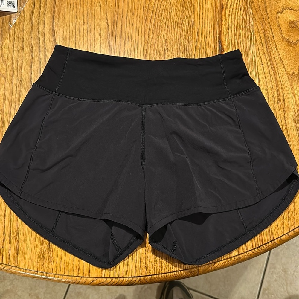 Lululemon speed up high rise lined shorts, size 2 tall in black with pockets